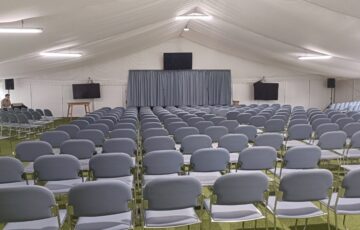 The Marquee For 50 -220 people. Bespoke setup in U shape or theatre style. With/without tables Whiteboard, full AV setup – see packages